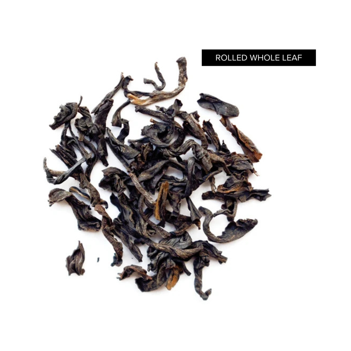 A pile of rolled whole leaf english breakfast tea on a white background.